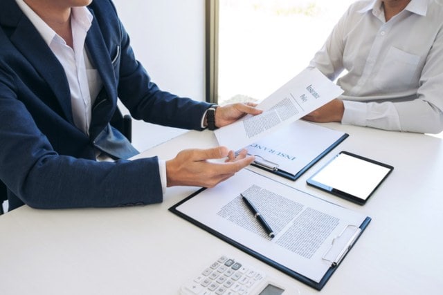 lawyer meeting discussing probate documents in morgan county kentucky