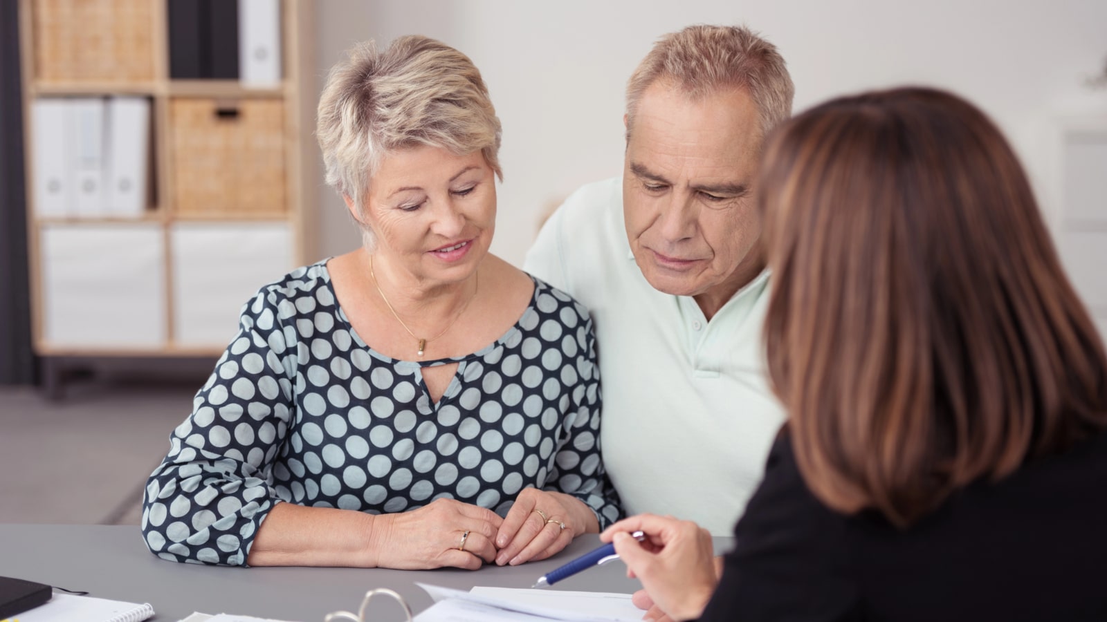 Elderly couple meeting estate planning attorney in lexington