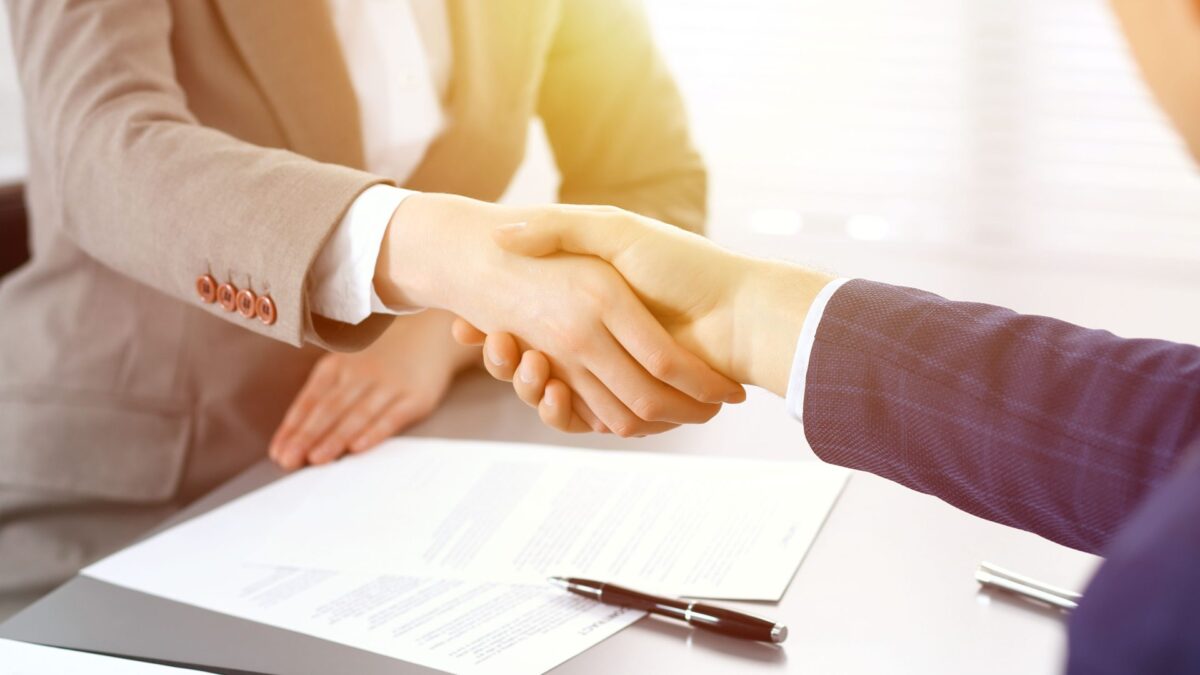 people shaking hands over probate agreement in laurel county