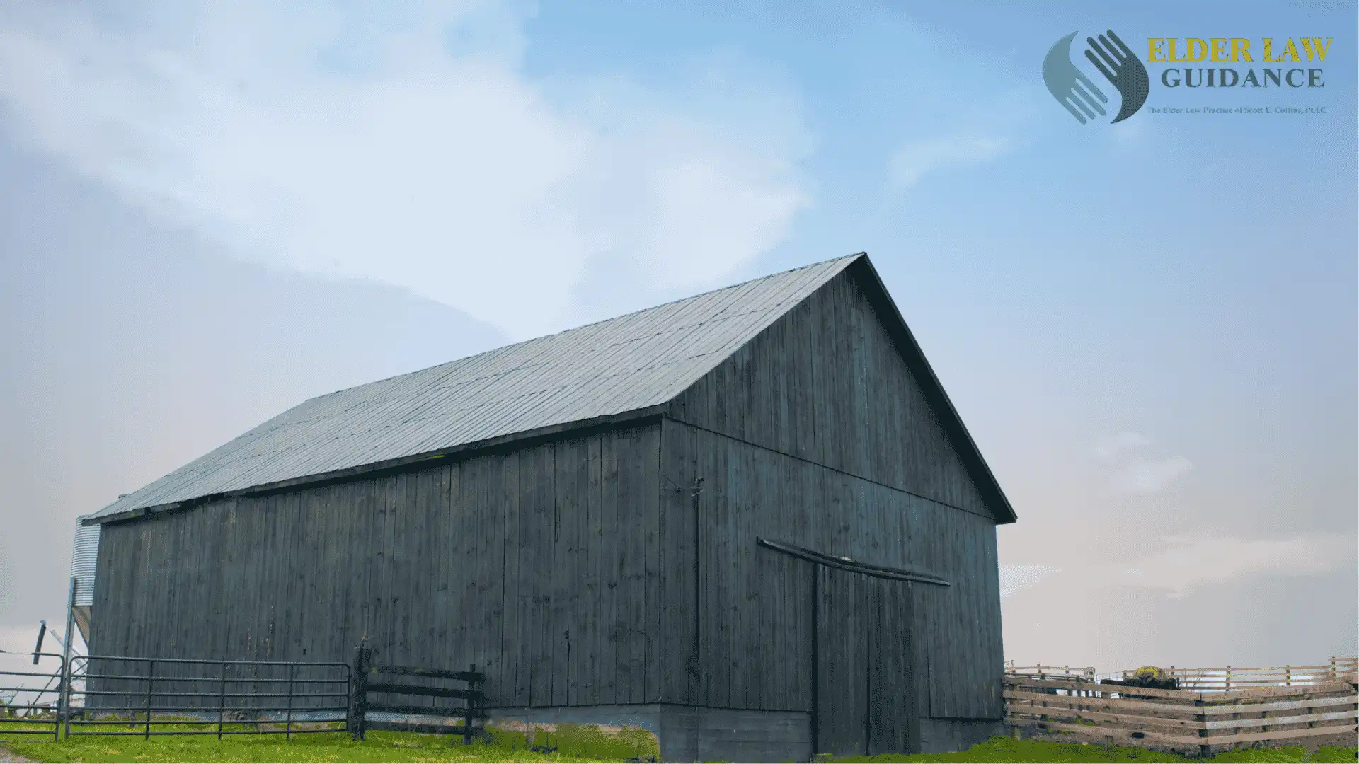 a large barn sitting on top of a grassy field in Richmond Kentucky, where a large senior population often needs estate planning services